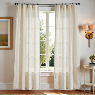 Neutral linen-blend curtains softly filtering daylight in a living room