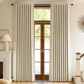 Curtain rings with clip-compatible blackout curtains in a warm, styled room