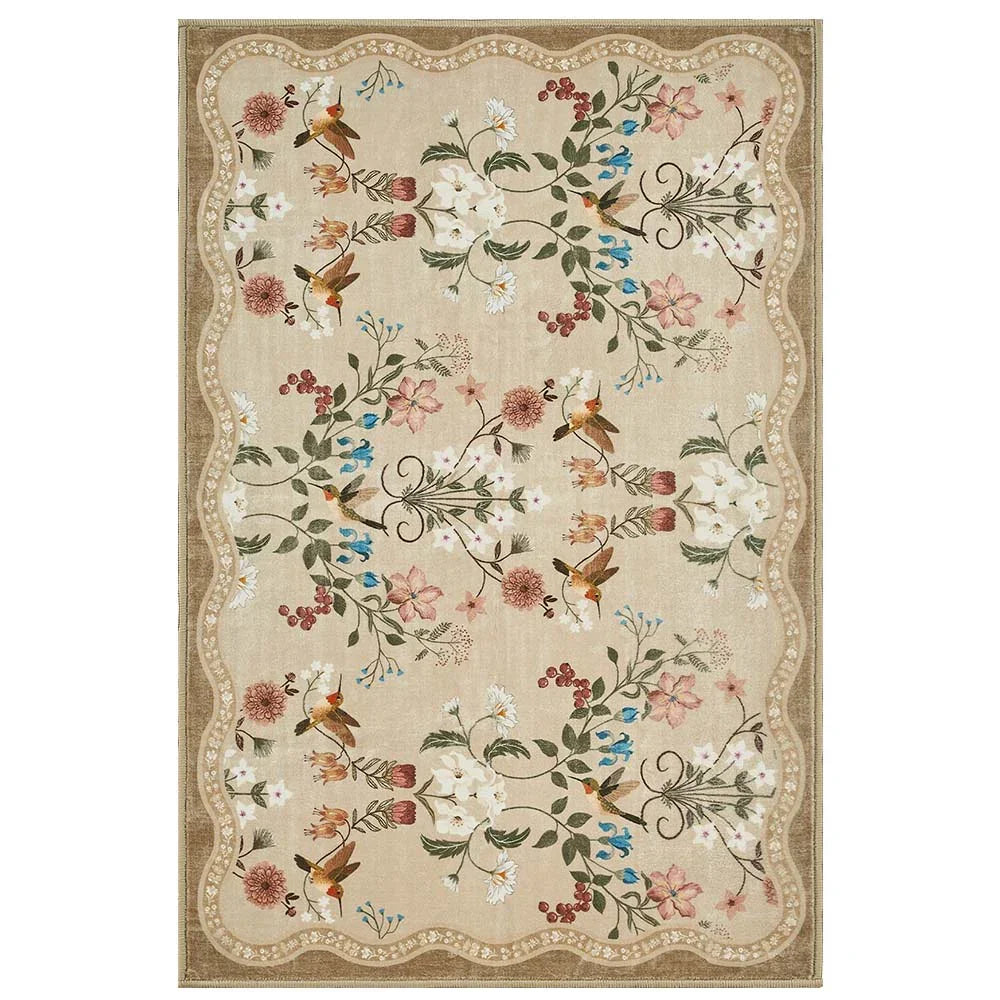 Beige floral area rug with birds and scalloped border in vintage botanical design