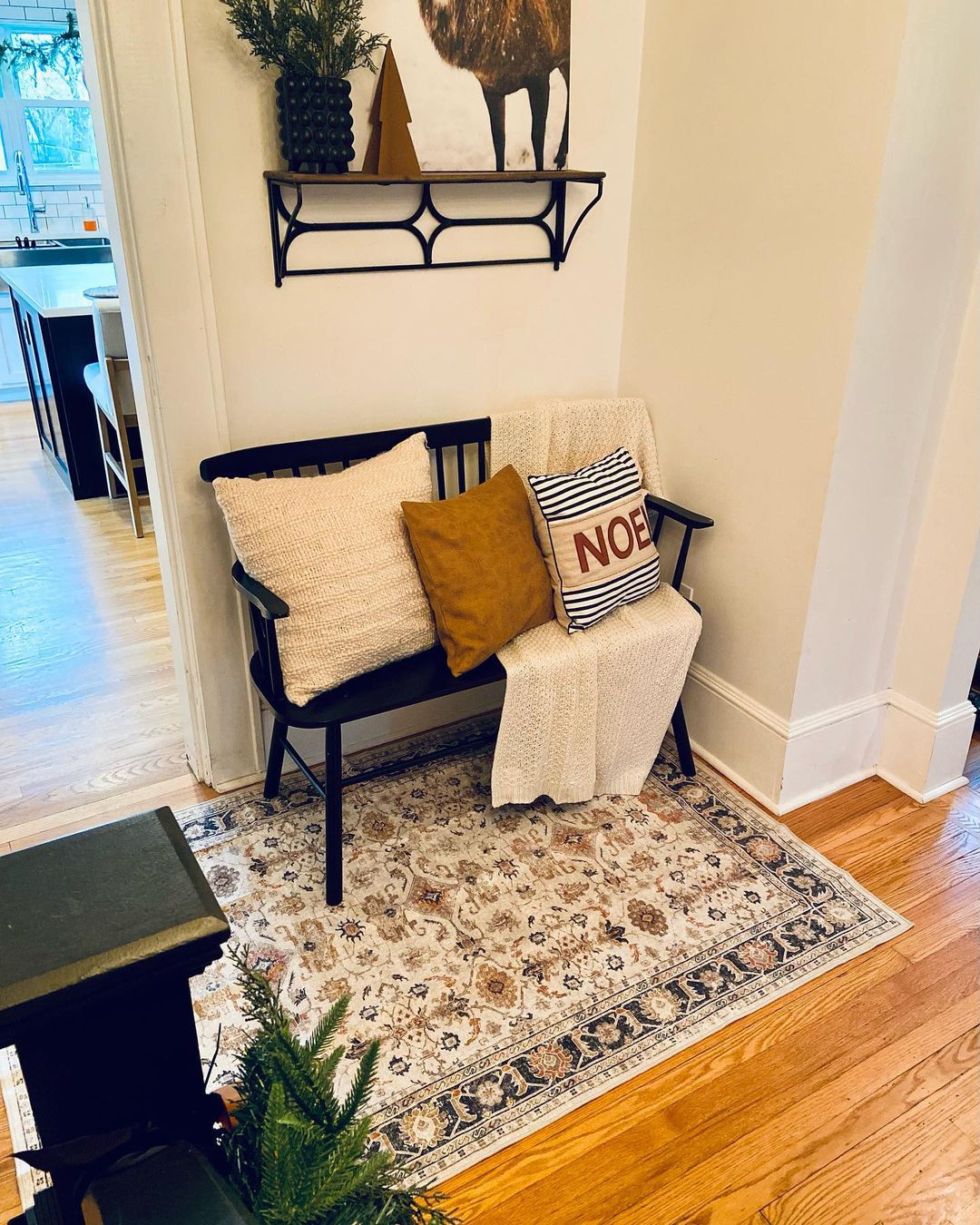 Real home photo of Jinchan floral rug